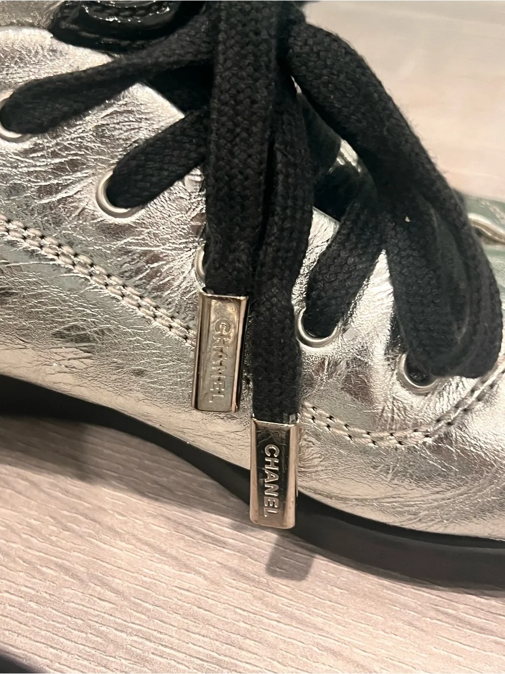 CHANEL Silver and Black Low-Top Lace-Up Sneaker